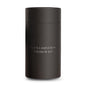 Black cylindrical container with 'DLUX Lamination Eyebrow Kit' text on a white background